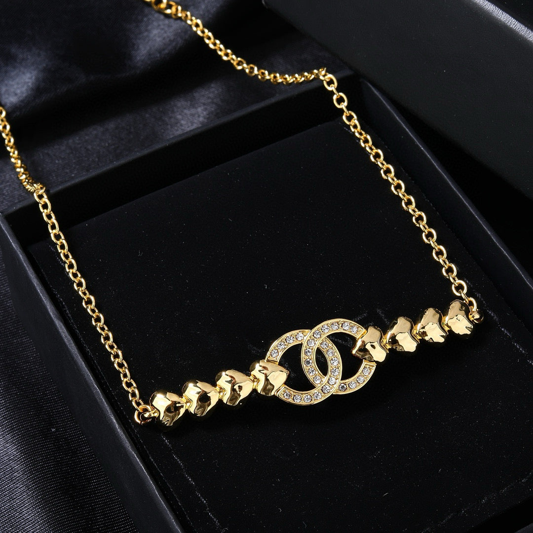 Double-C Emblem Pendant Necklace in Gold-Tone – Design 009 styled product view