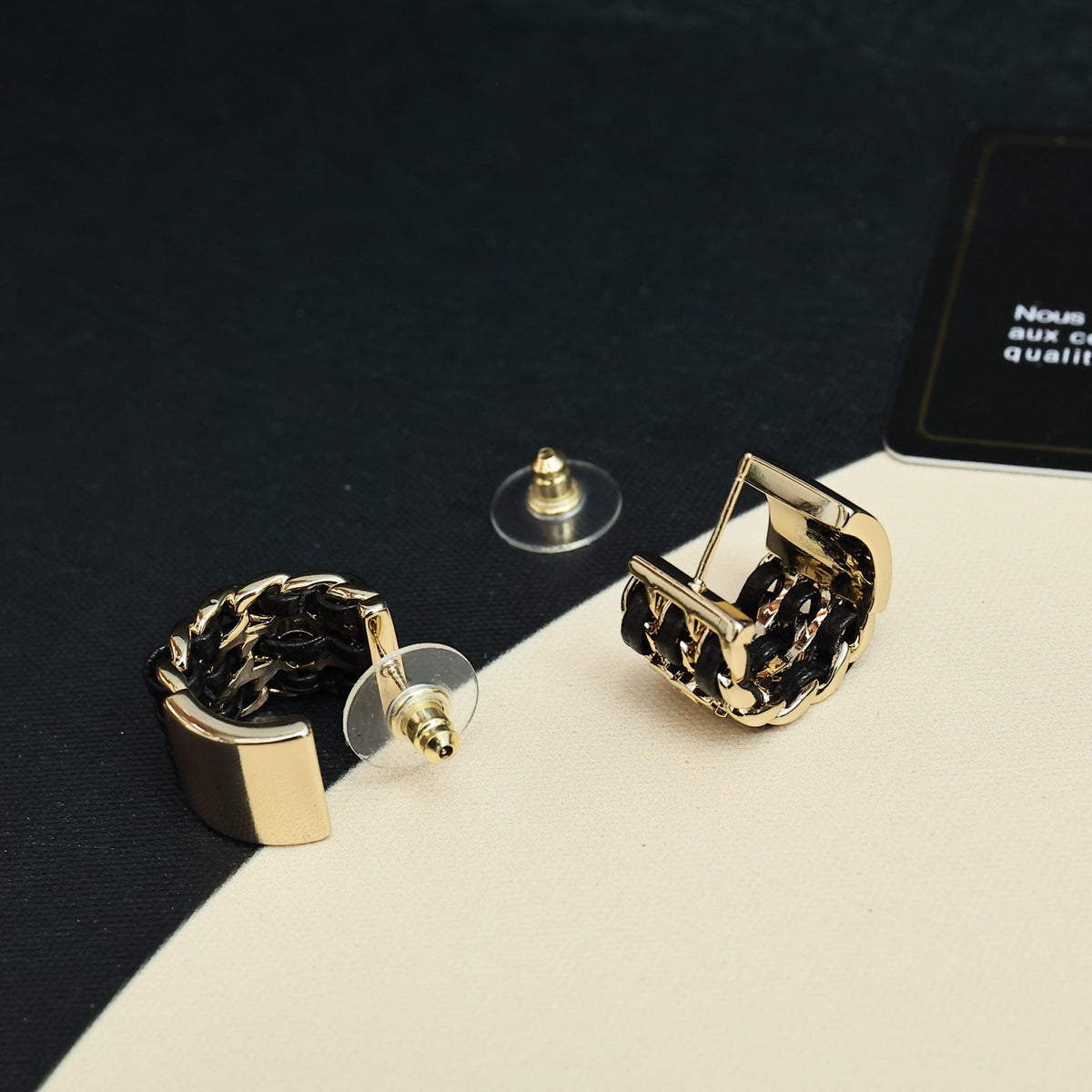 Double-C Emblem Stud Earrings in Gold-Tone – Black Detail – Design 002 close-up detail