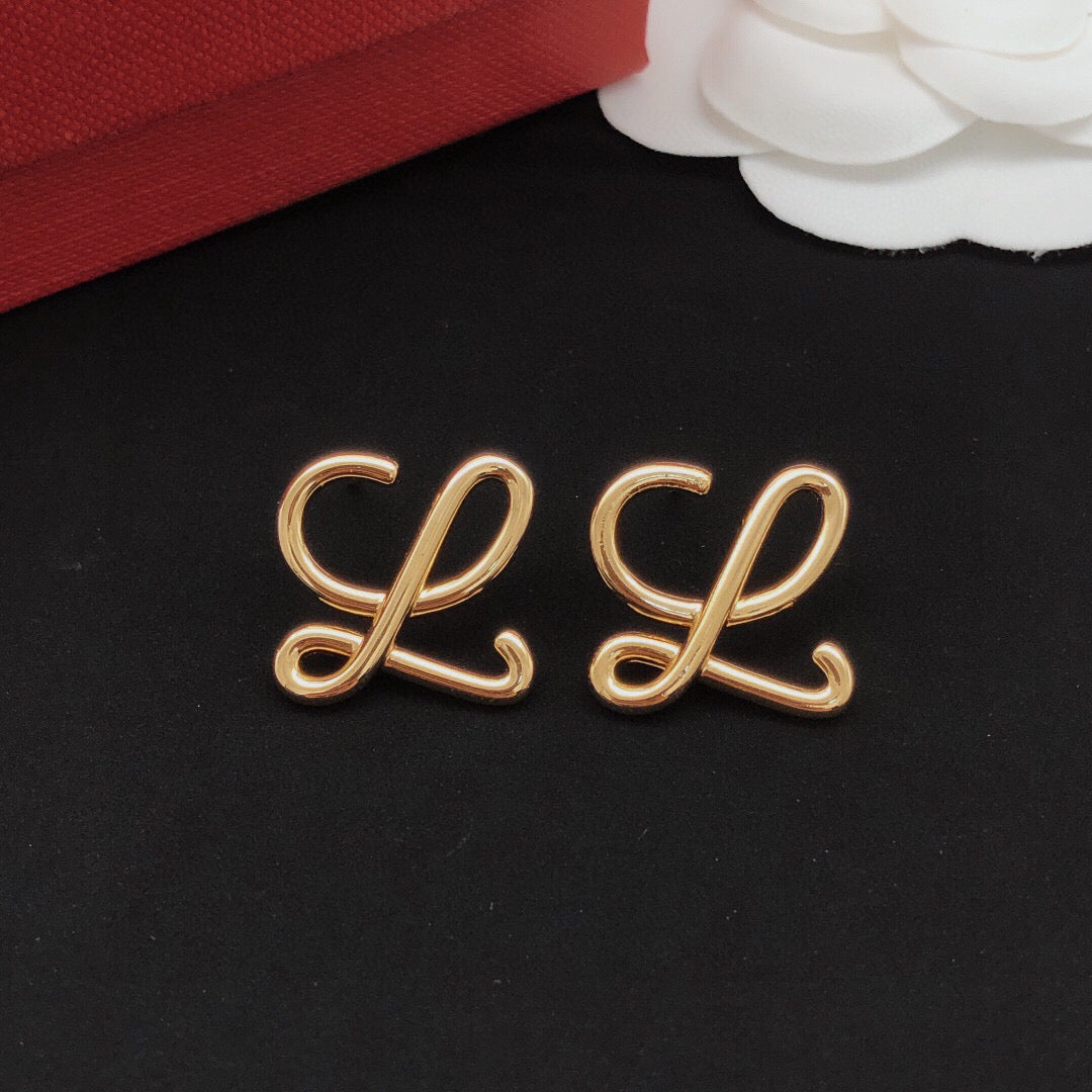 Sculptural Stud Earrings in Polished Metal-Tone – Design 01 front view