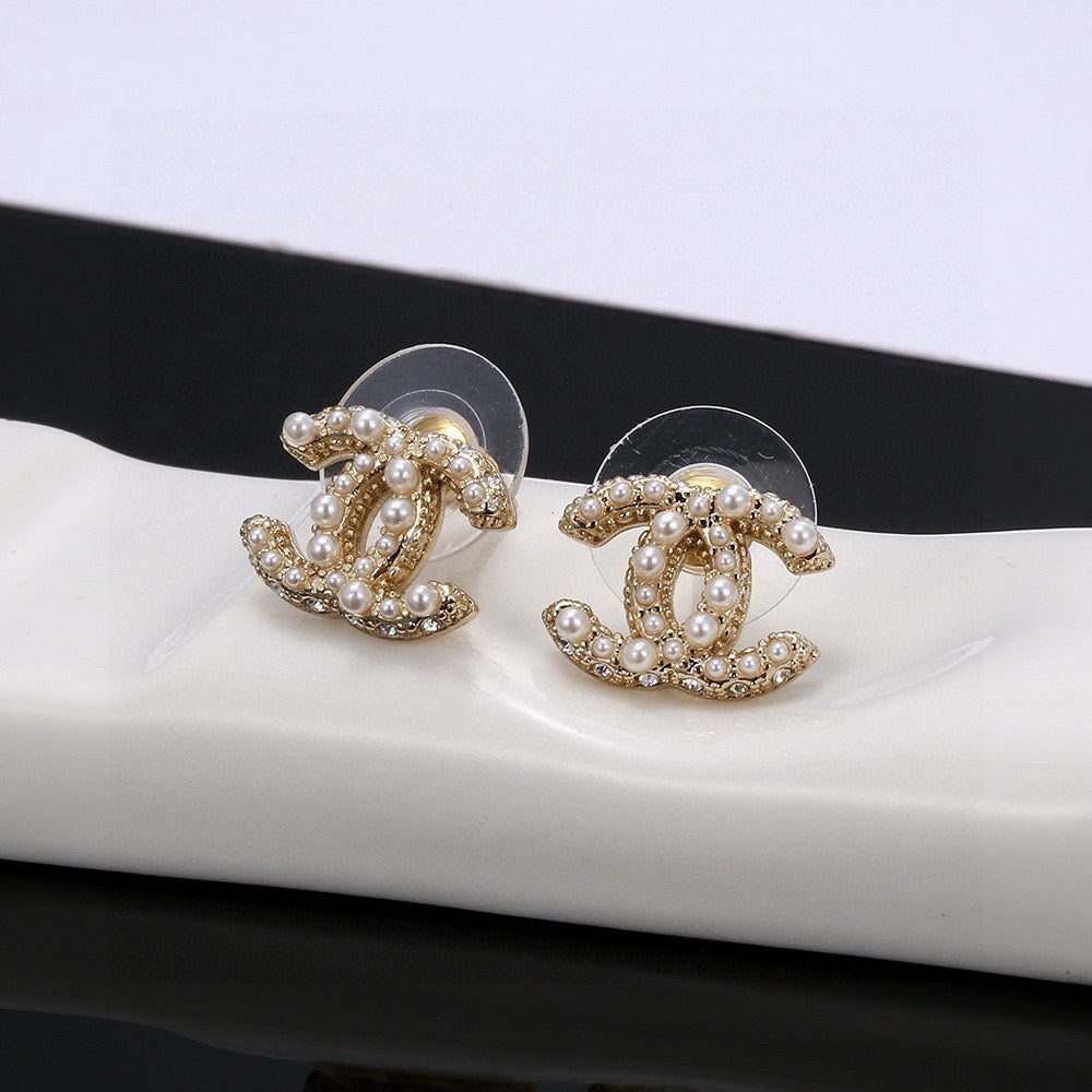 Signature Emblem Stud Earrings in Silver-Tone – Design 016 detail view