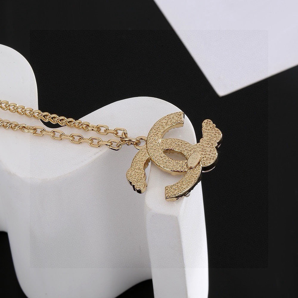 Double-C Emblem Pearl-Detail Pendant Necklace – Pearl Detail – Design 030 styled product view