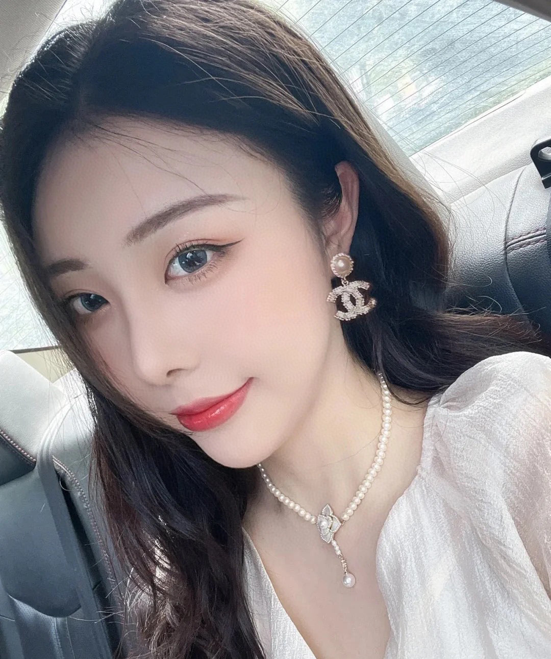 Double-C Emblem Pearl-Detail Stud Earrings – Pearl Detail side detail
