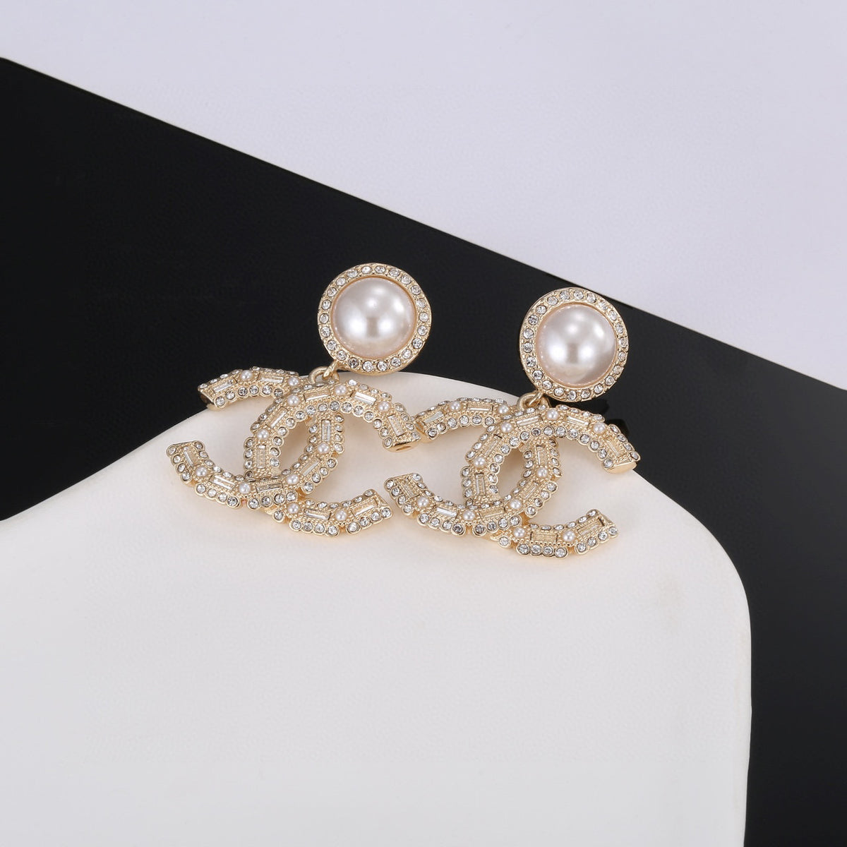Double-C Emblem Pearl-Detail Stud Earrings – Pearl Detail styled product view