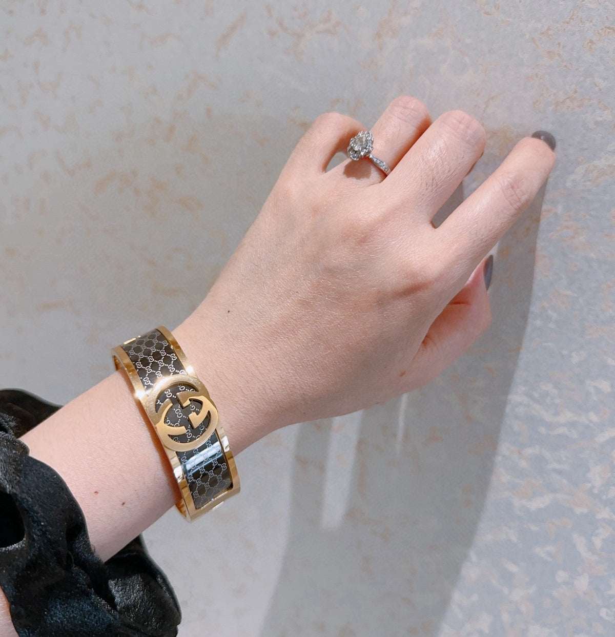 Double-G Emblem Bangle in Polished Metal-Tone – Design 001 detail view