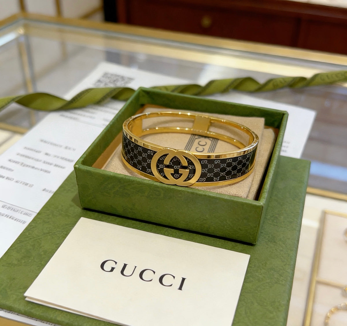 Double-G Emblem Bangle in Polished Metal-Tone – Design 001 front product view