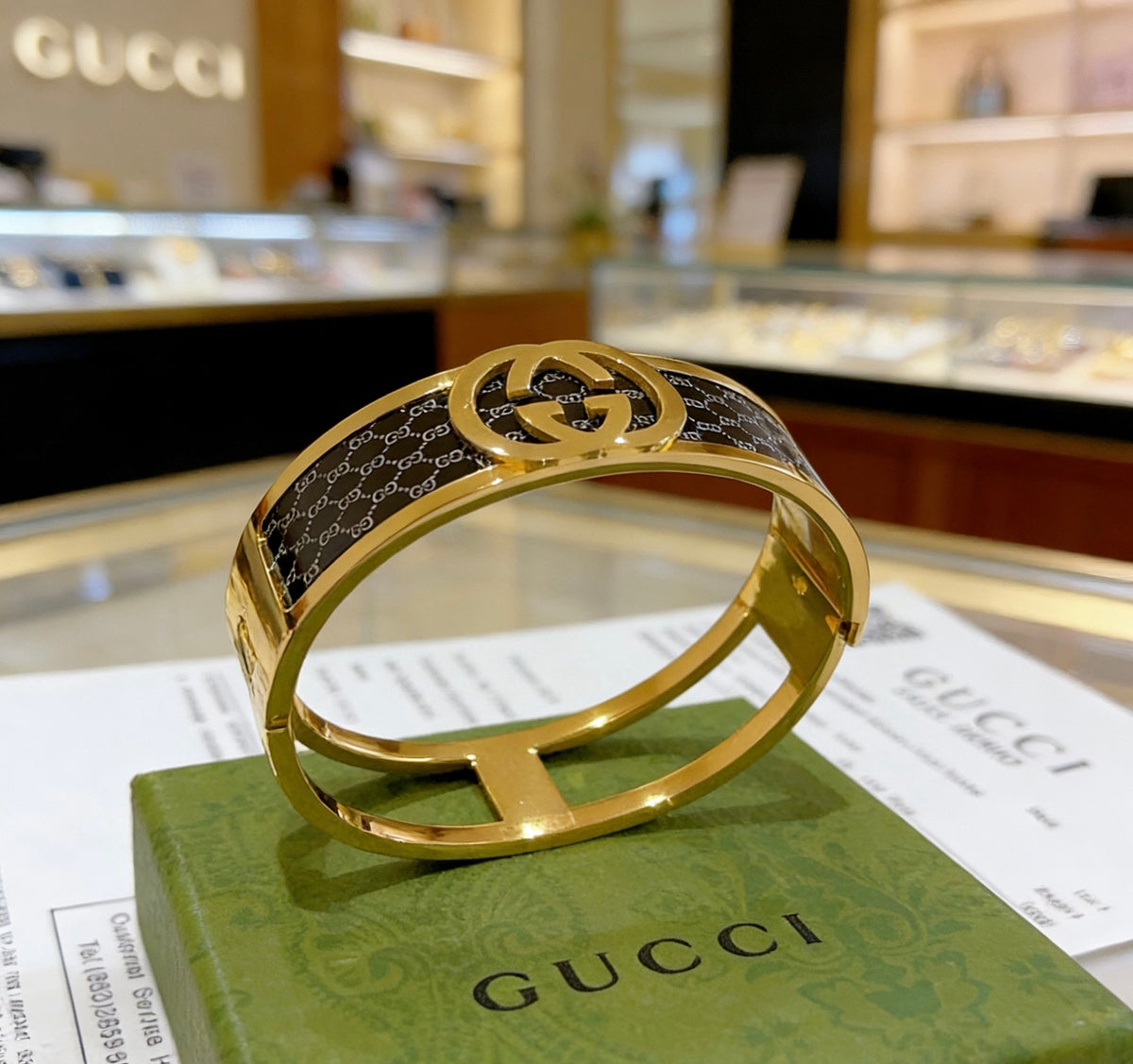 Double-G Emblem Bangle in Polished Metal-Tone – Design 001 close-up detail