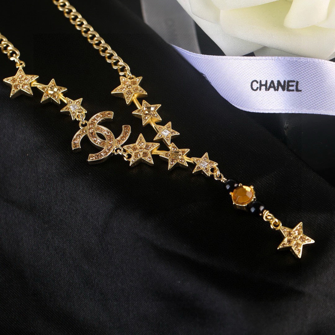 Signature Emblem Pendant Necklace in Polished Metal-Tone – White Detail close-up detail