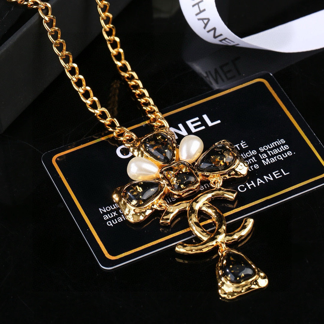 Double-C Emblem Pendant Necklace in Gold-Tone – Design 001 close-up detail