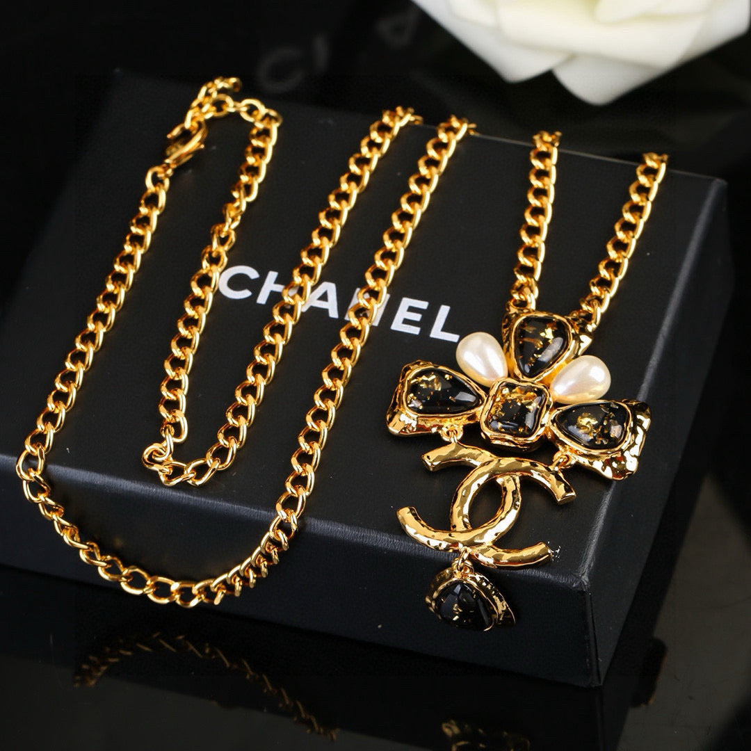Double-C Emblem Pendant Necklace in Gold-Tone – Design 001 side detail