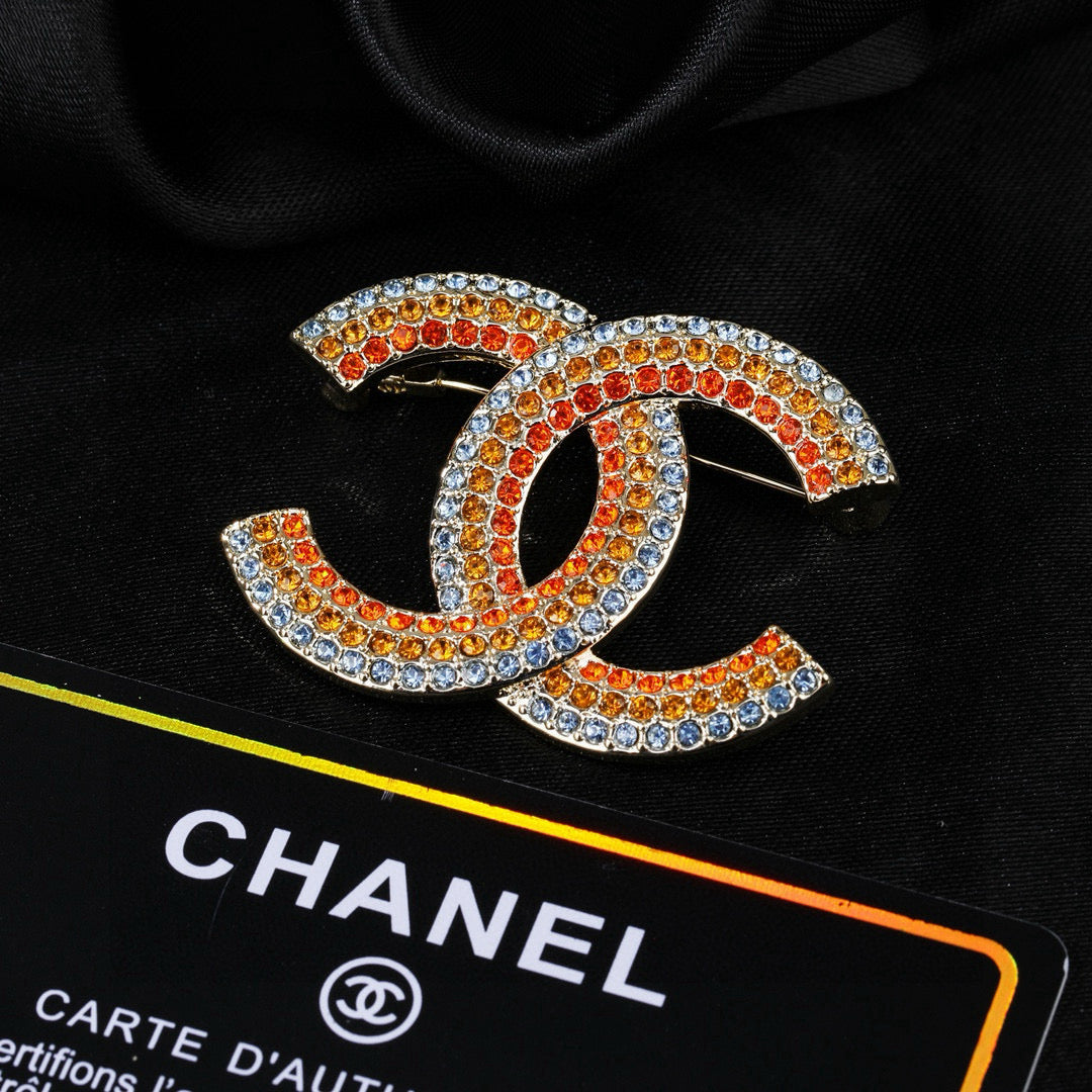 Double-C Emblem Brooch in Polished Metal-Tone – Design 013 detail view