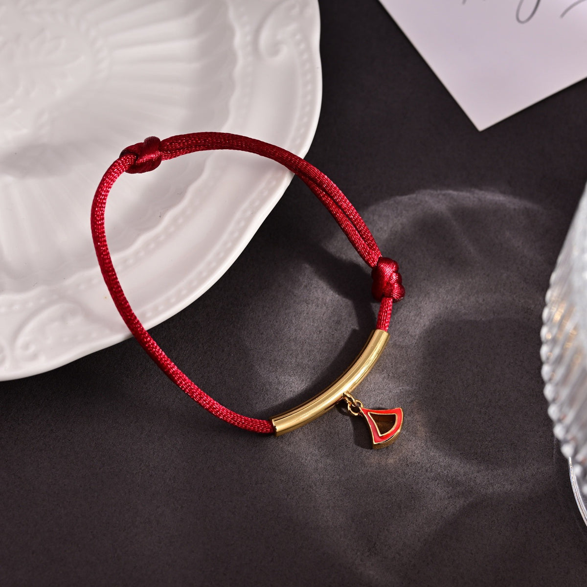 Red Cord Braided Bracelet in Polished Metal-Tone – Red Cord Detail front product view