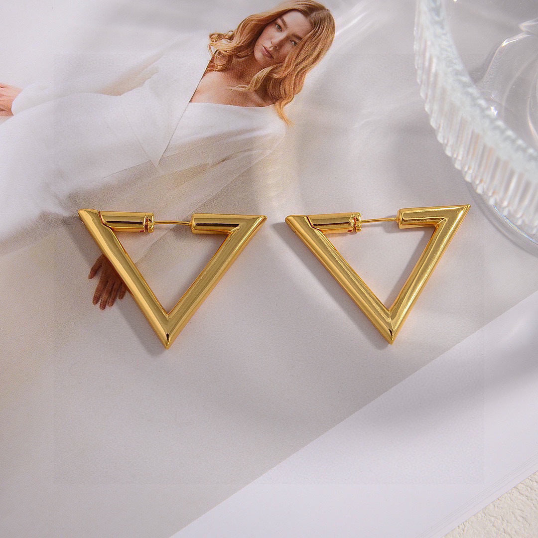 Triangle Stud Earrings in Gold-Tone – Design 01 styled detail