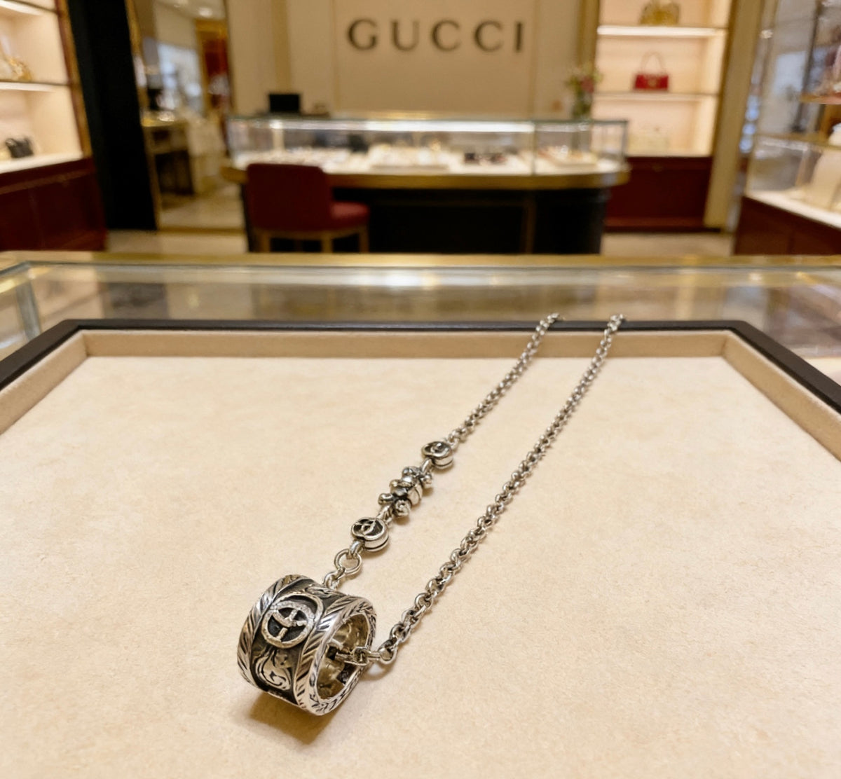Double-G Emblem Pendant Necklace in Polished Metal-Tone – Design 038 close-up detail