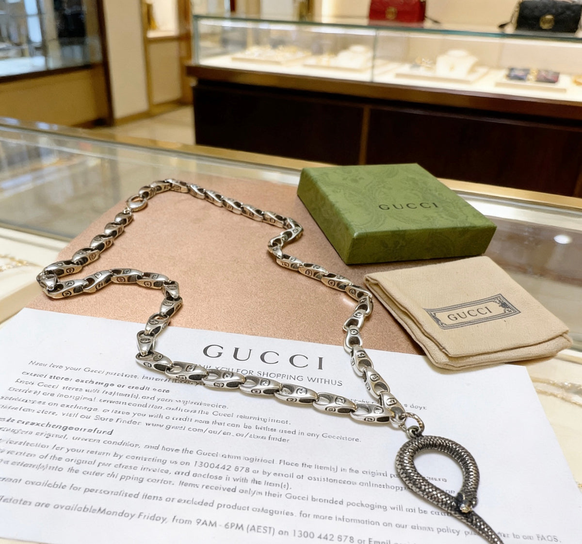 Double-G Emblem Pendant Necklace in Polished Metal-Tone – Design 036 close-up detail