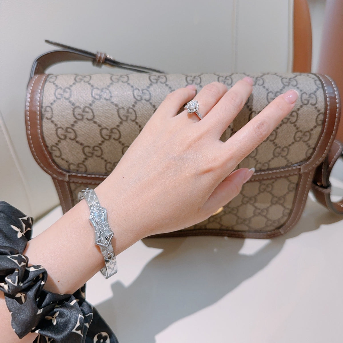 Double-G Emblem Bangle in Polished Metal-Tone – Design 016 detail view