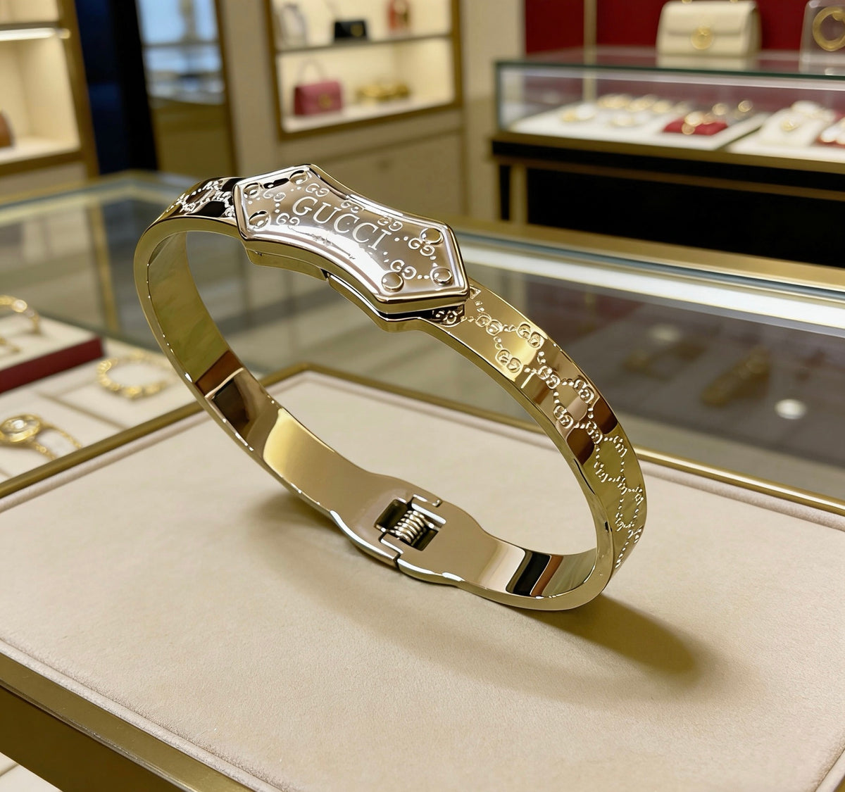Double-G Emblem Bangle in Polished Metal-Tone – Design 016 close-up detail