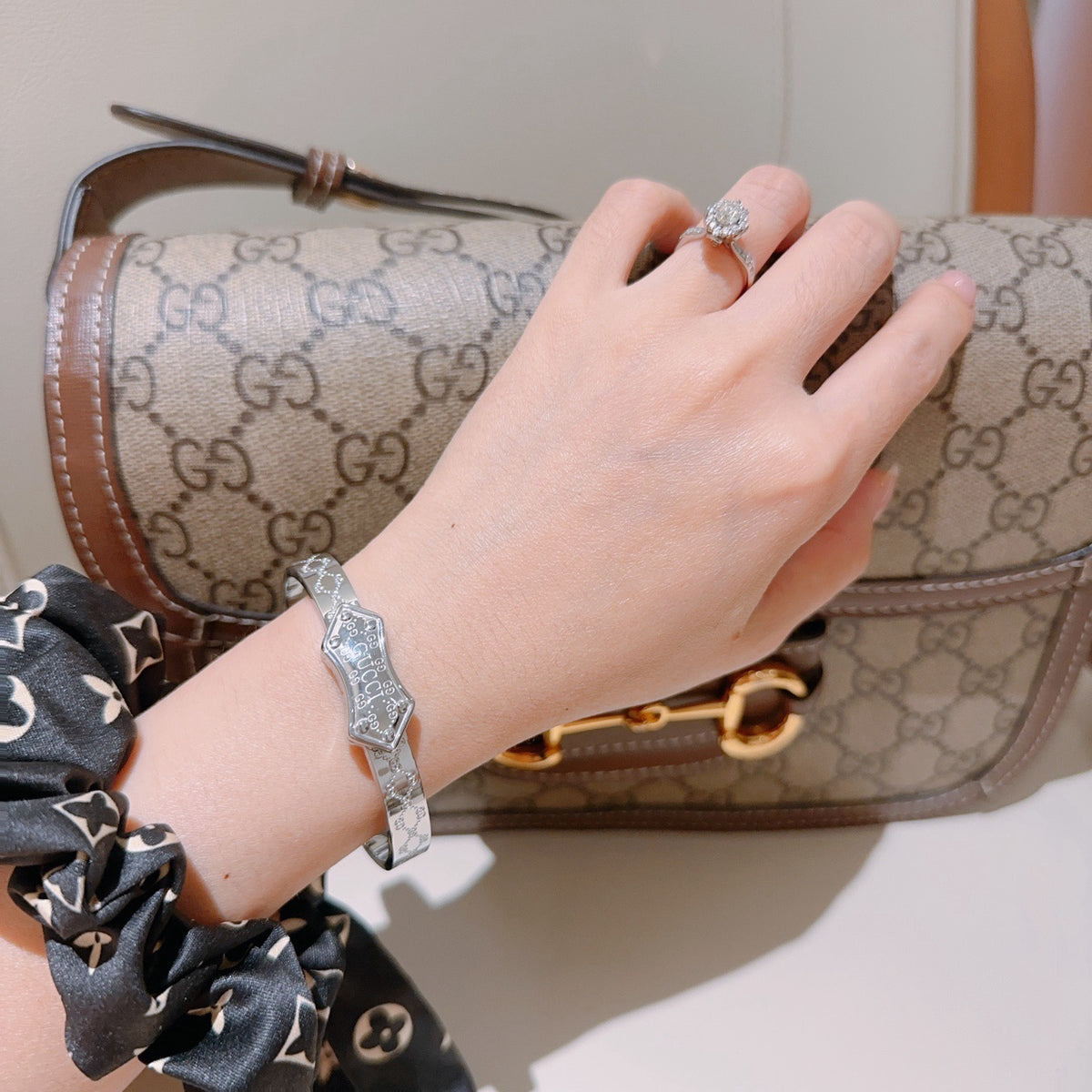Double-G Emblem Bangle in Polished Metal-Tone – Design 016 detail view