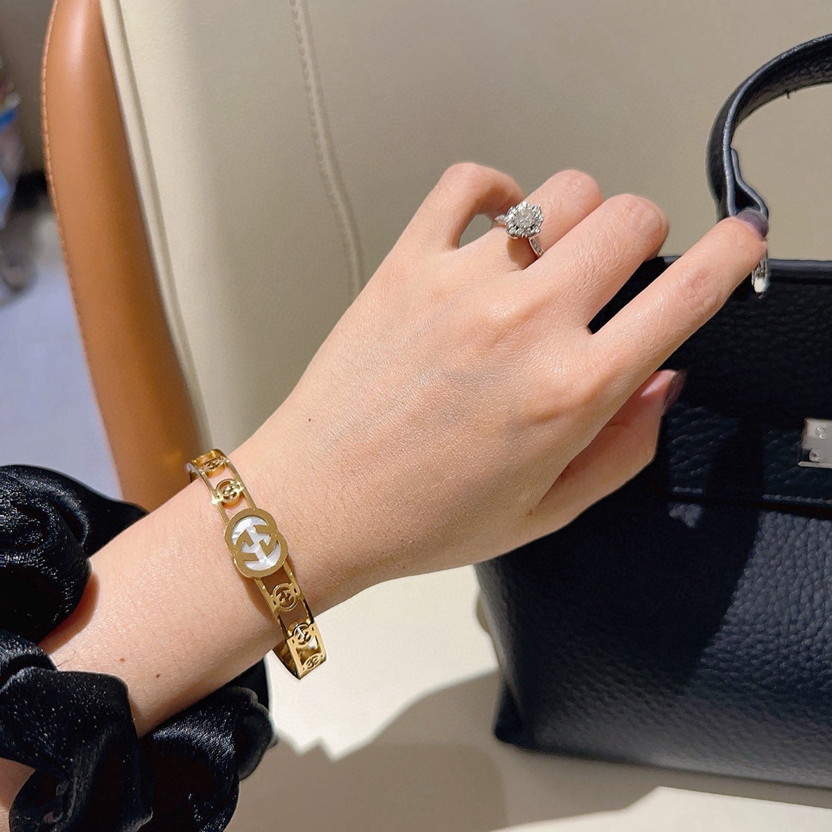 Double-G Emblem Bangle in Polished Metal-Tone – Design 017 detail view
