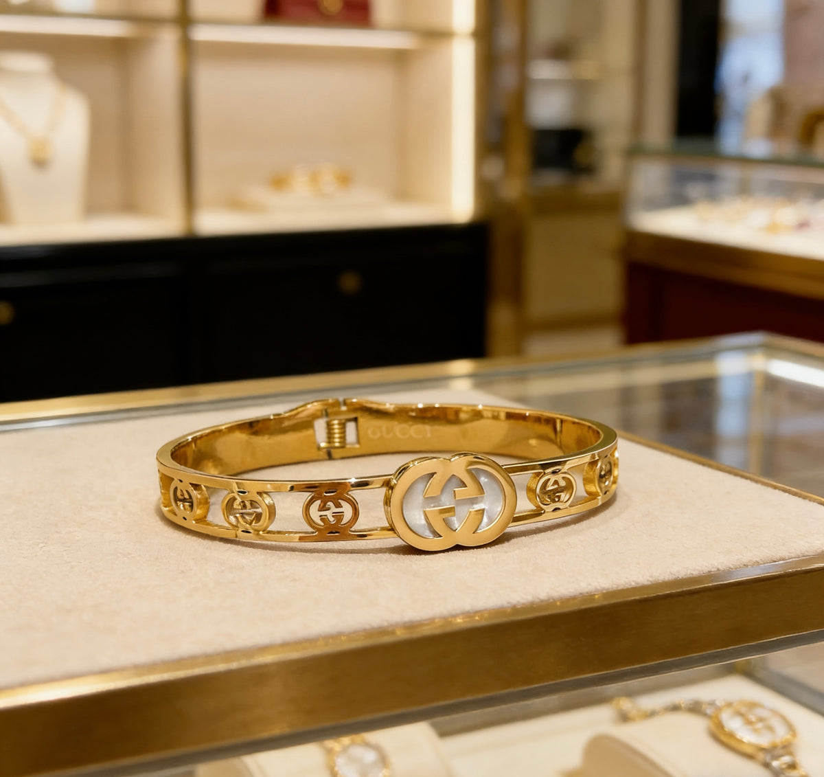 Double-G Emblem Bangle in Polished Metal-Tone – Design 017 front product view