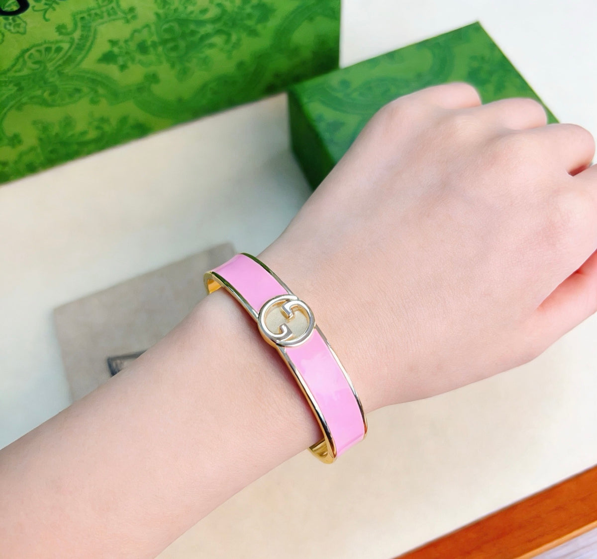 Double-G Emblem Bangle in Polished Metal-Tone – Design 014 styled product view