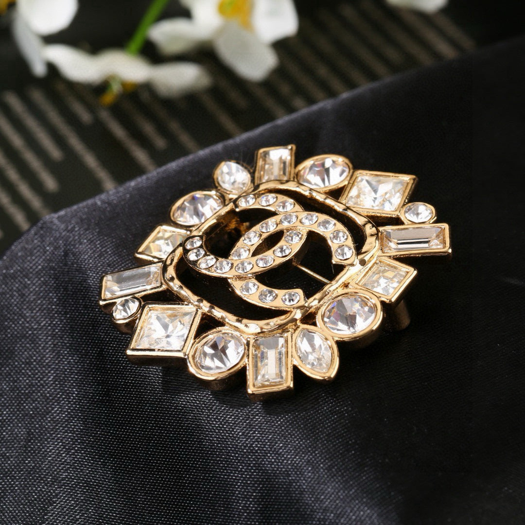 Double-C Emblem Brooch in Polished Metal-Tone – Design 016 styled product view