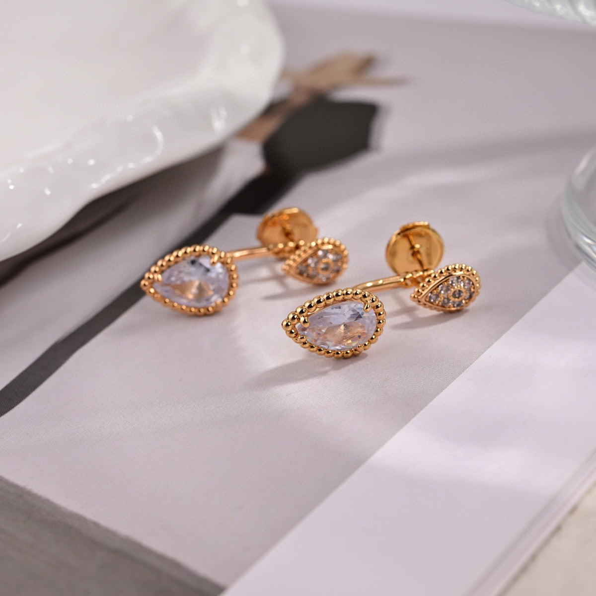 Signature Emblem Stud Earrings in Polished Metal-Tone – Design 019 detail view