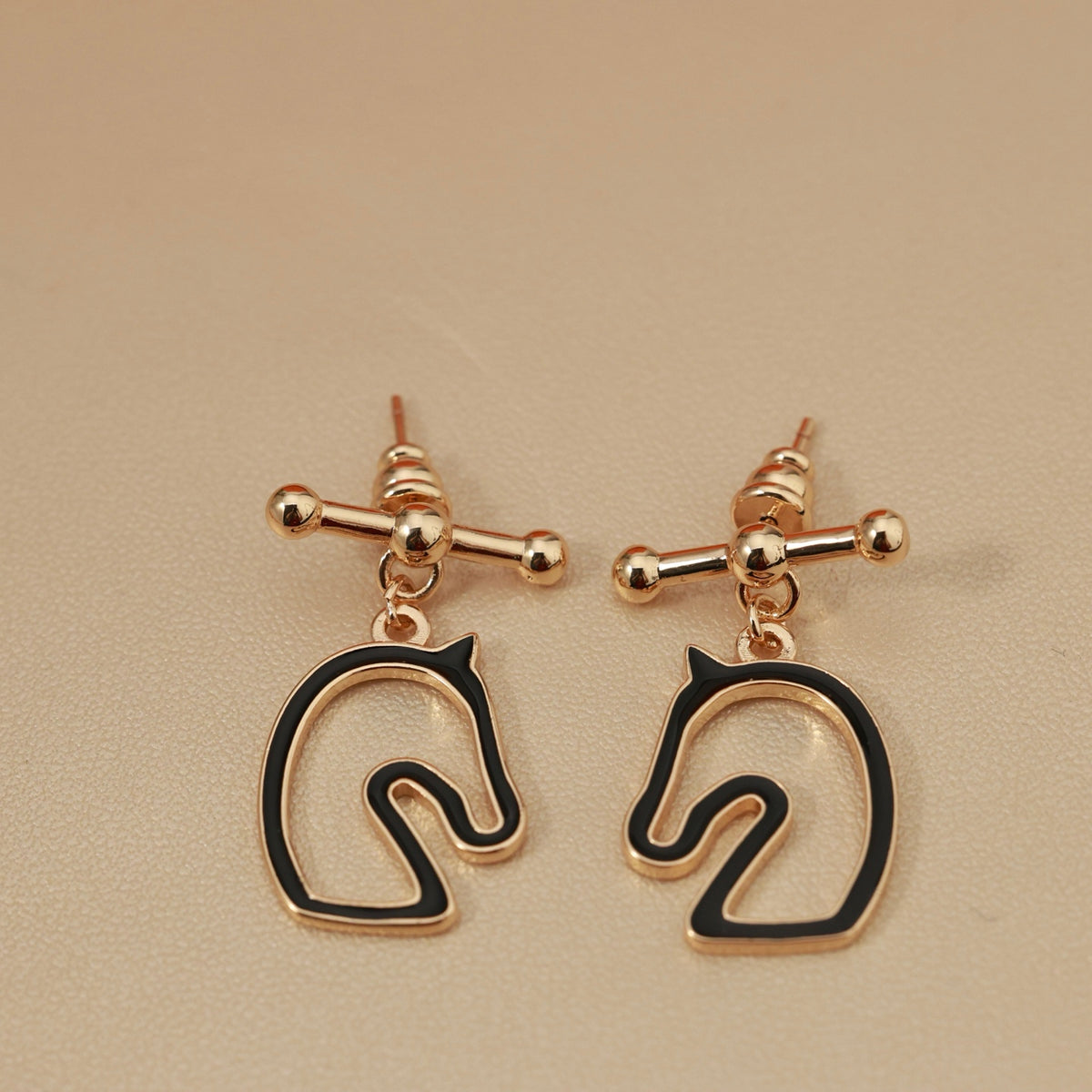 Horse Head Stud Earrings in Rose-Gold-Tone – Rose Gold Detail front product view