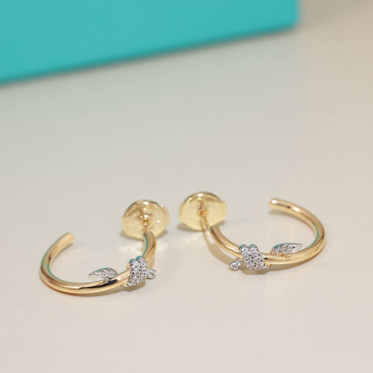 Knot Stud Earrings in Gold-Tone – Knot Detail – Design 02 front product view