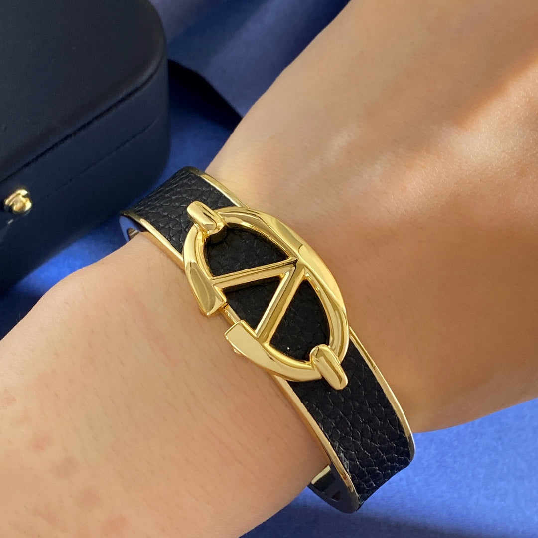 V Emblem Cuff Bracelet in Gold-Tone – Black front view