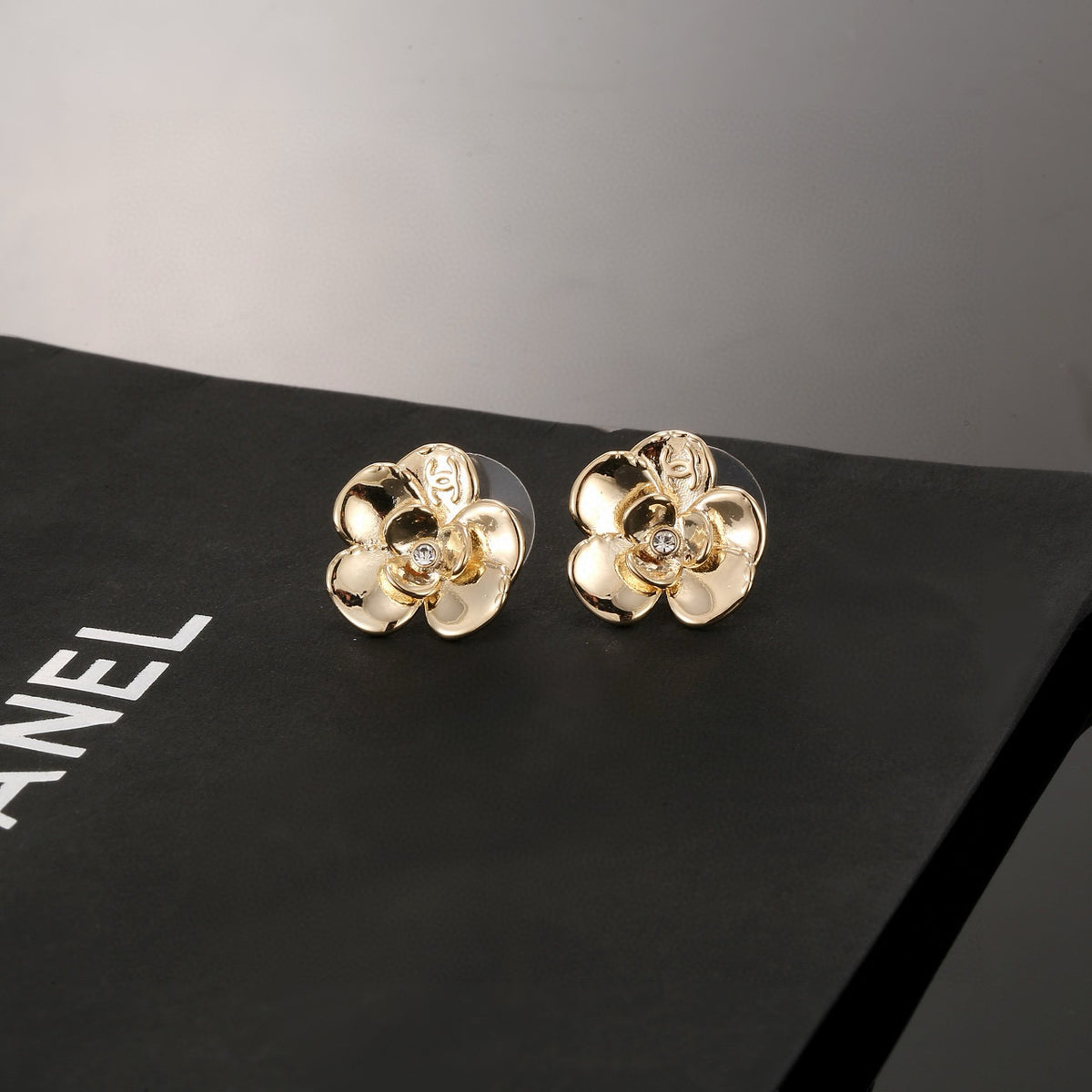 Camellia Stud Earrings in Gold-Tone – Camellia Detail – Design 003 styled product view