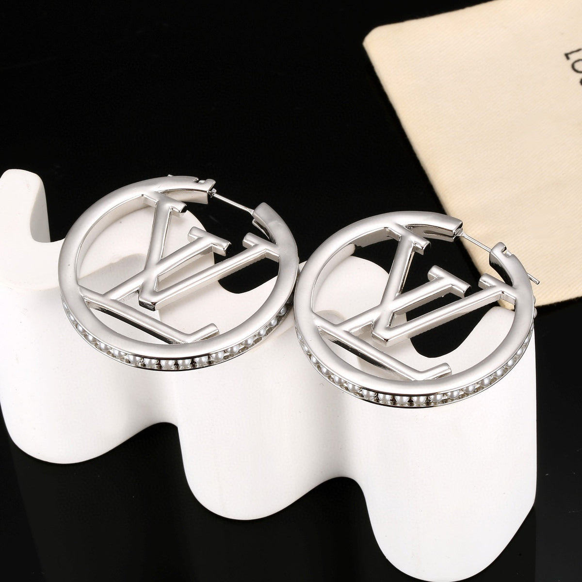Letter Emblem Stud Earrings in Polished Metal-Tone – Design 011 detail view