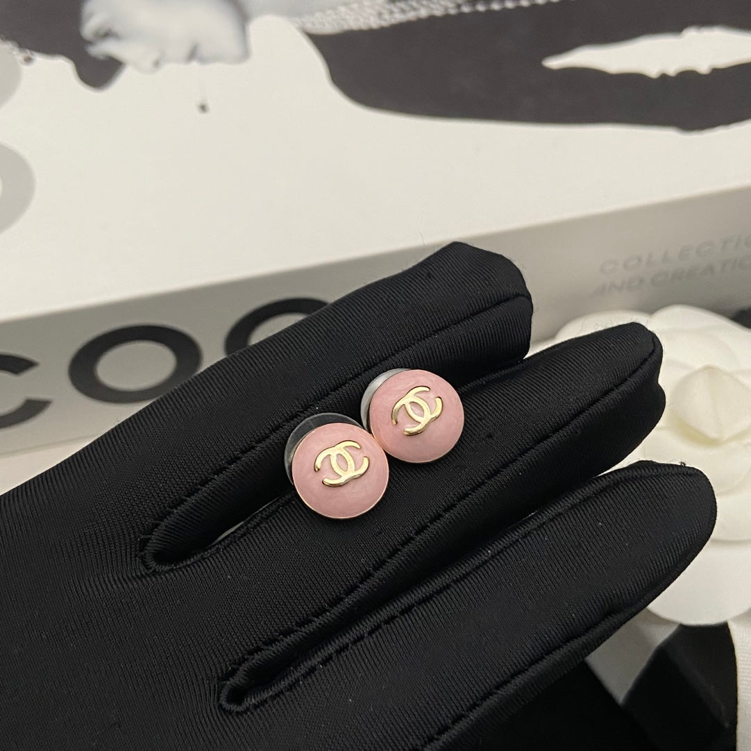 Round Stud Earrings in Polished Metal-Tone – Pink Detail detail view