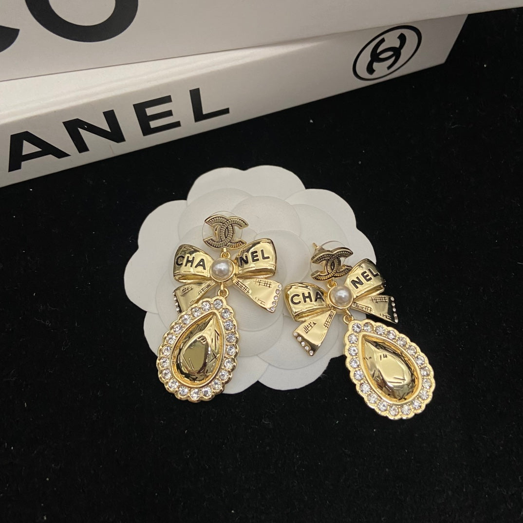 Bow Stud Earrings in Polished Metal-Tone – Design 001 close-up detail
