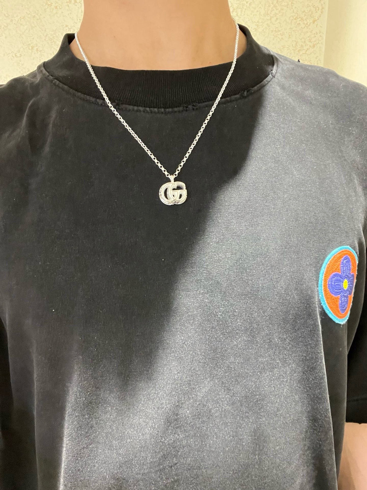 Double-G Emblem Pendant Necklace in Polished Metal-Tone – Design 079 detail view