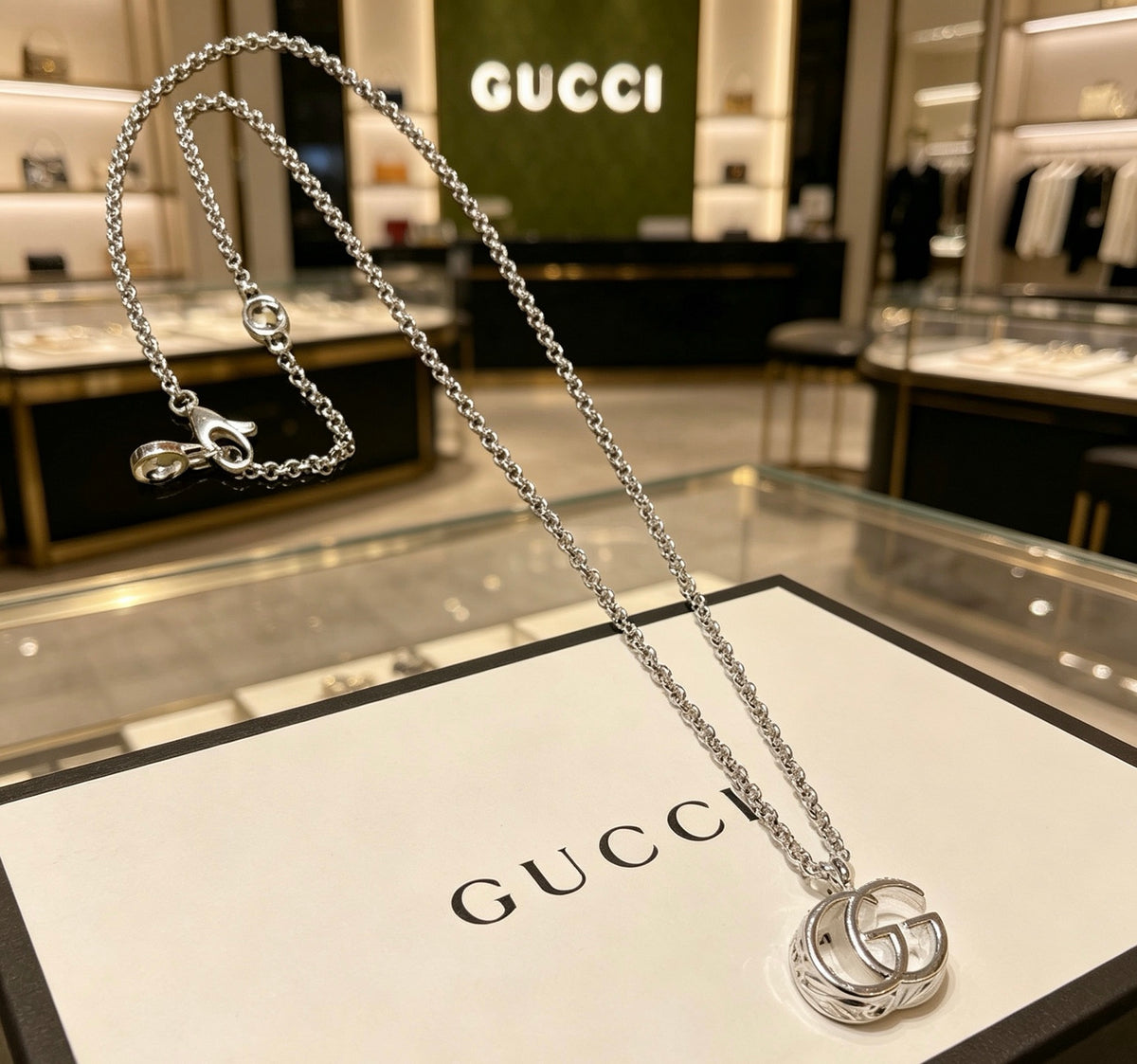 Double-G Emblem Pendant Necklace in Polished Metal-Tone – Design 079 close-up detail
