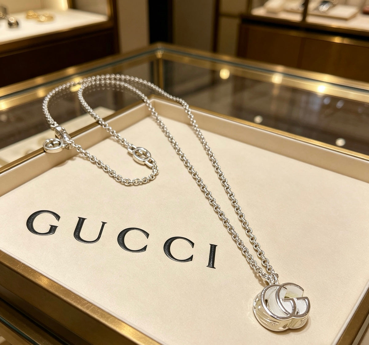 Double-G Emblem Pendant Necklace in Polished Metal-Tone – Design 079 front product view