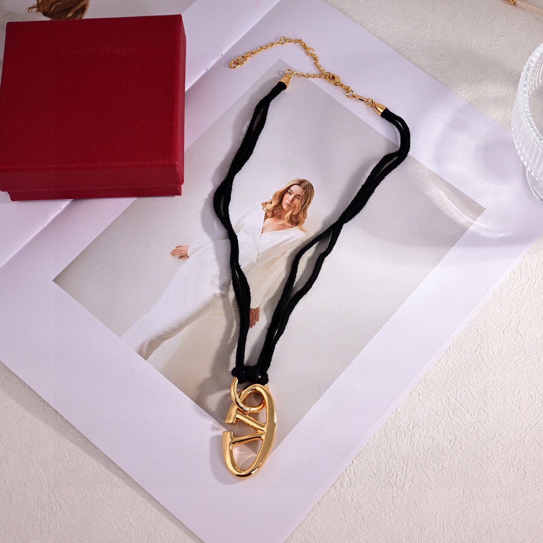 Signature Emblem Pendant Necklace in Polished Metal-Tone – Design 01 close-up view
