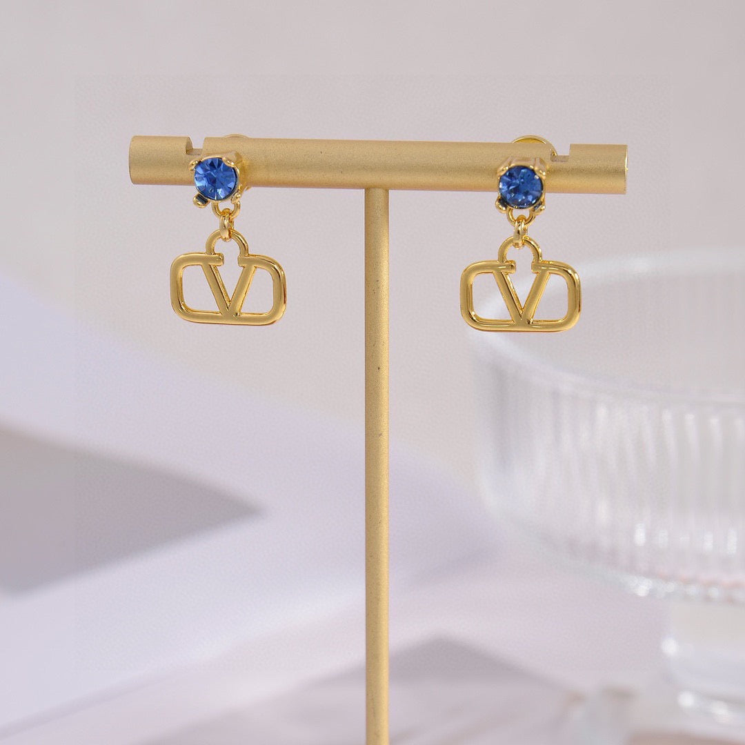 Signature Emblem Stud Earrings in Gold-Tone – Design 04 detail view