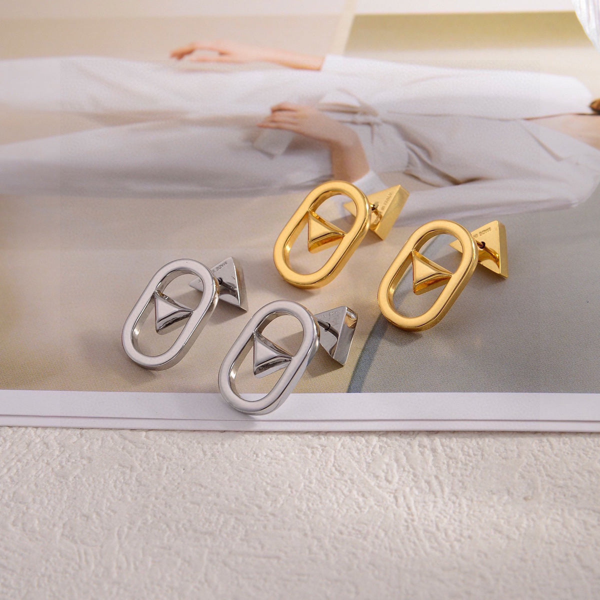 Triangle Stud Earrings in Gold-Tone – Triangle Detail main product view