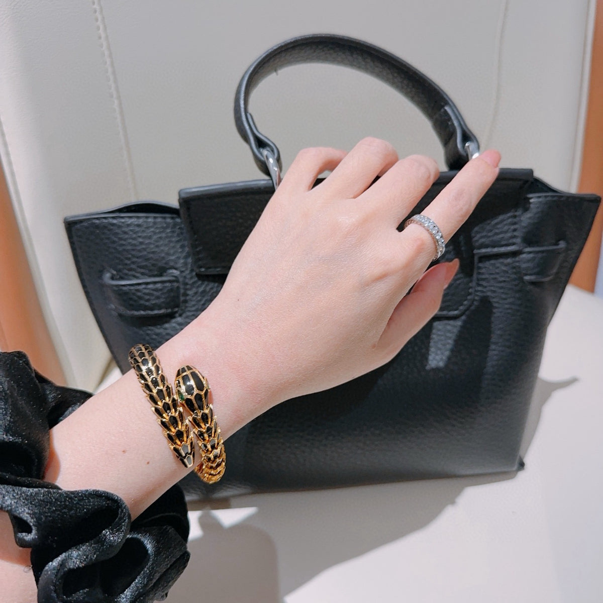 Serpentine Bangle in Polished Metal-Tone – Serpentine Detail – Design 011 styled product view