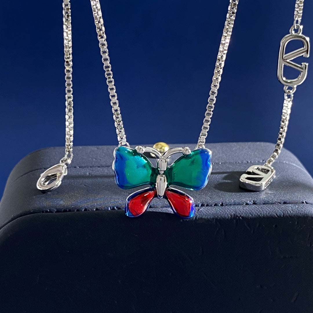 V Emblem Long Pendant Necklace – Design 01 styled detail