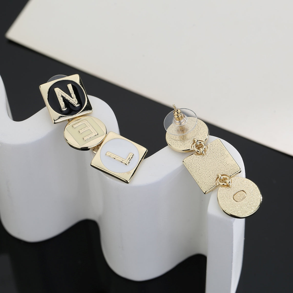 Letter Stud Earrings in Polished Metal-Tone – Design 009 close-up detail