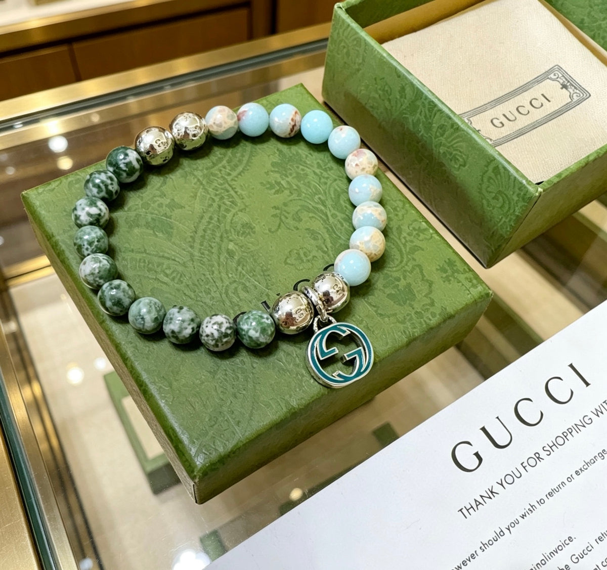 Double-G Emblem Beaded Bracelet in Polished Metal-Tone – Crystal Detail – Design 013 styled product view