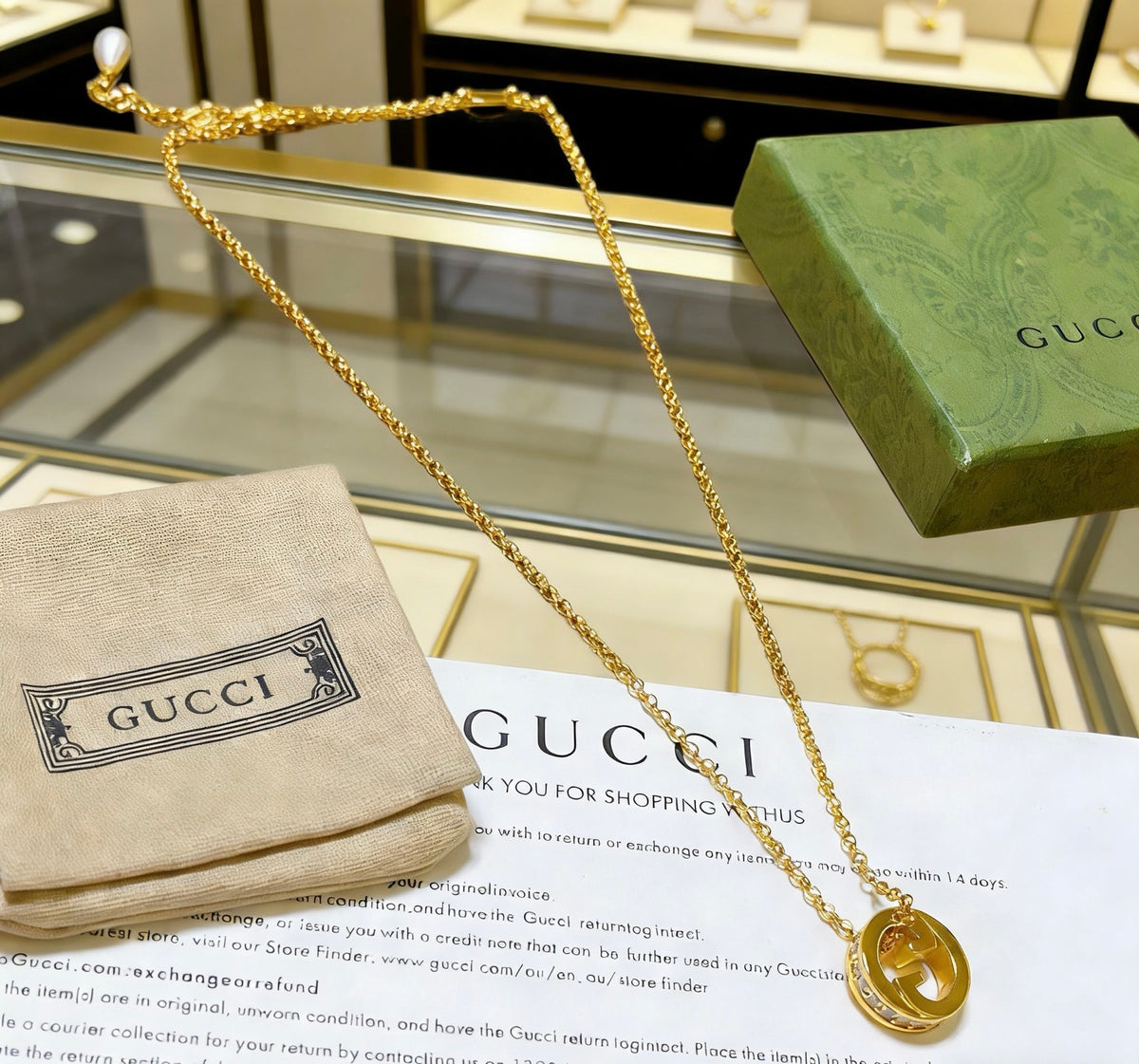 Double-G Emblem Pendant Necklace in Polished Metal-Tone – Design 122 close-up detail