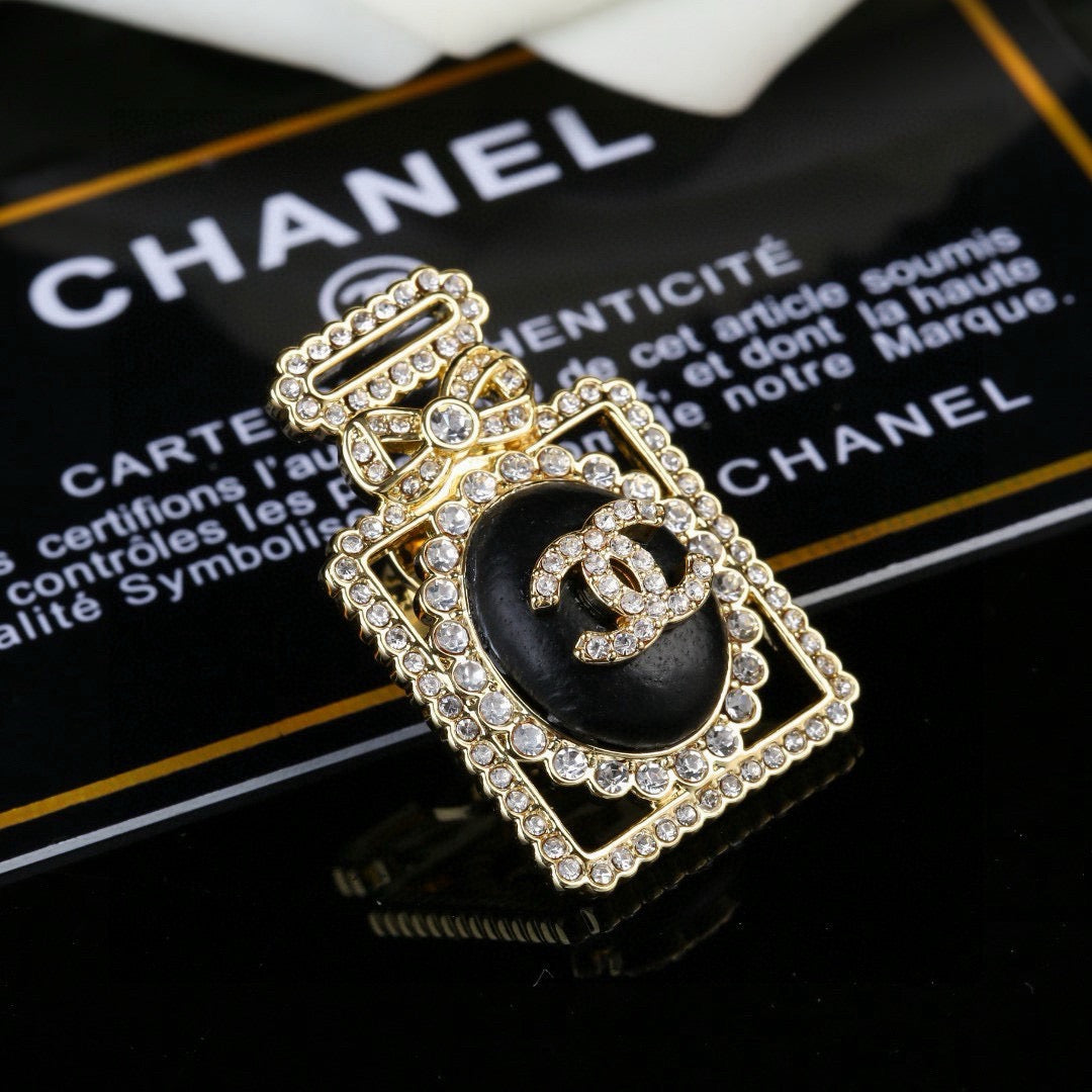 Signature Emblem Brooch in Polished Metal-Tone – Design 021 front product view