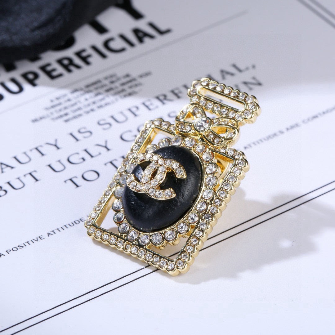 Signature Emblem Brooch in Polished Metal-Tone – Design 021 detail view