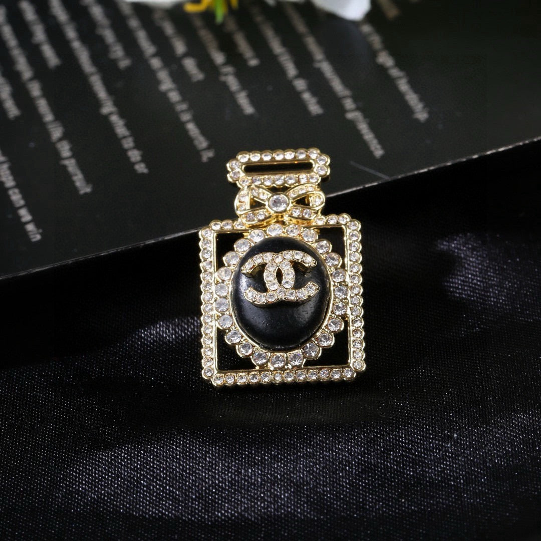 Signature Emblem Brooch in Polished Metal-Tone – Design 021 close-up detail