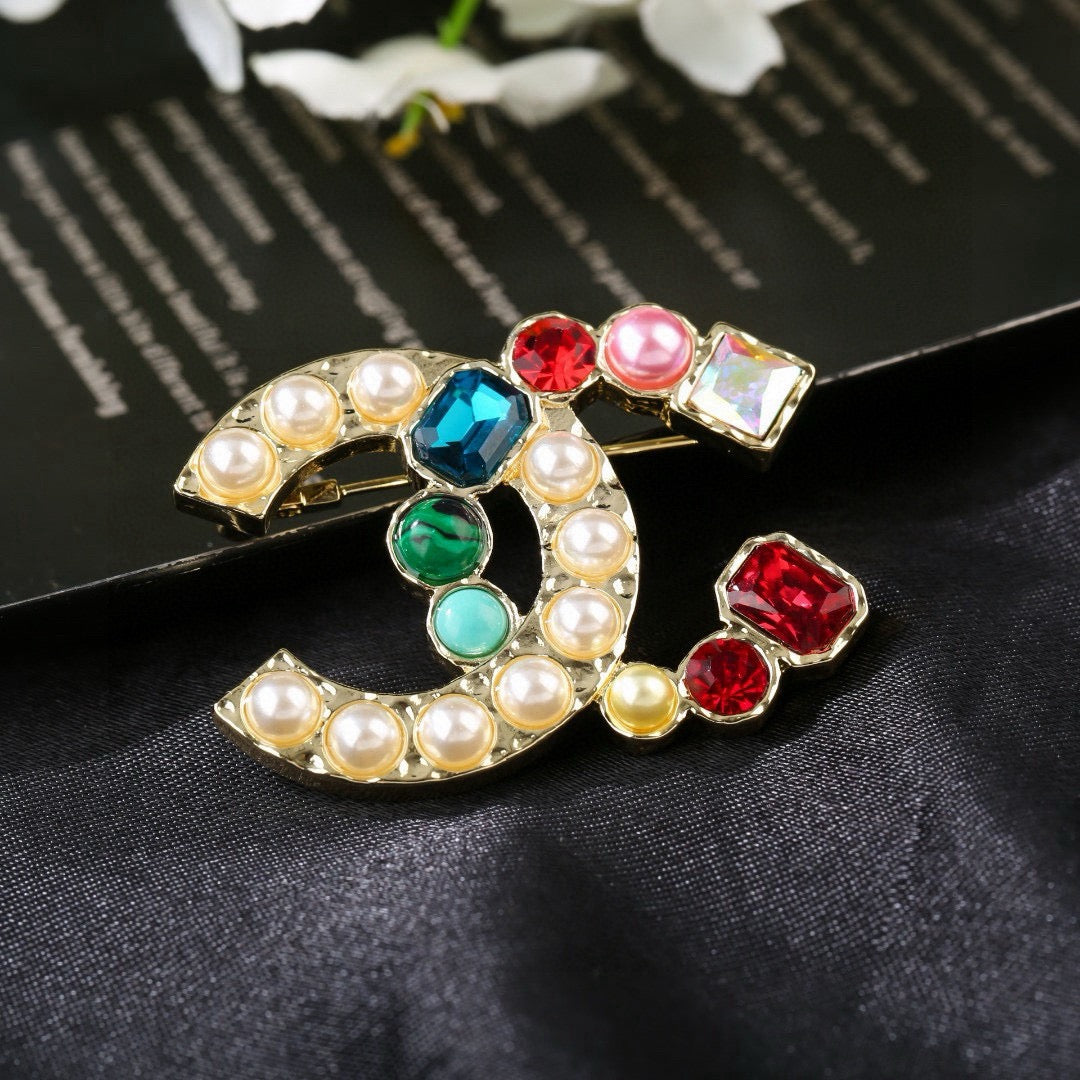 Double-C Emblem Brooch in Polished Metal-Tone – Pearl Detail – Design 005 main product view