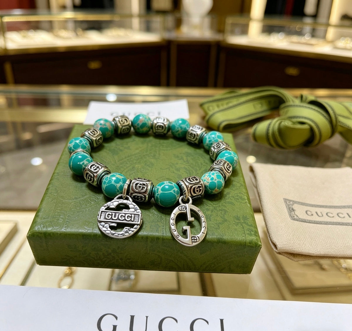 Double-G Emblem Bracelet in Polished Metal-Tone – Design 012 close-up detail