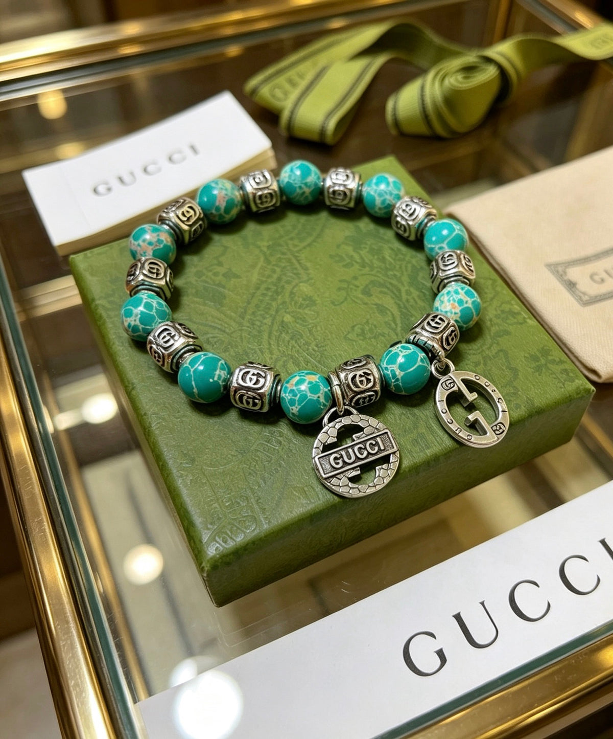 Double-G Emblem Bracelet in Polished Metal-Tone – Design 012 front product view